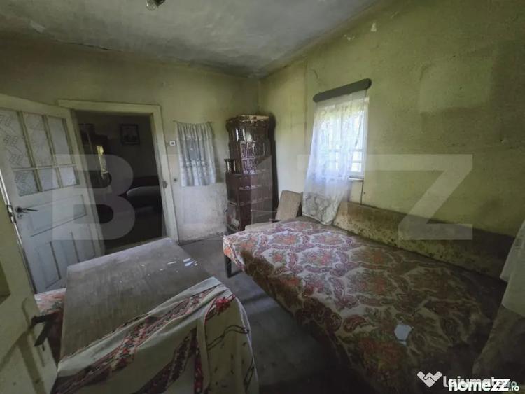 Casă cu 3 camere cu Teren 1954 Mp în Tomșani