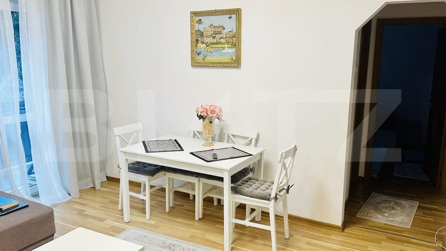 Apartament cu 2 camere semidecomandat, mobilat în Piața Centrală