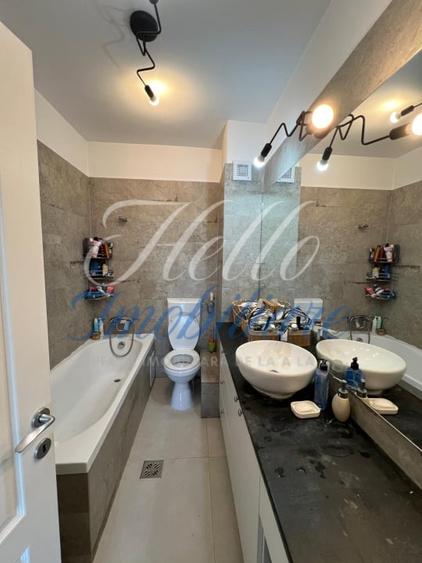 Apartament cu 2 camere semidecomandat, mobilat în Baciu