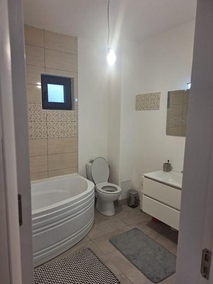 Casă cu 4 camere în Lumina