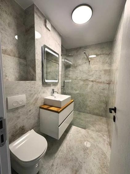 Apartament cu 3 camere semidecomandat, mobilat în Pipera — fotografia 3