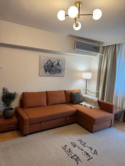 Apartament cu 3 camere semidecomandat, mobilat în Tineretului