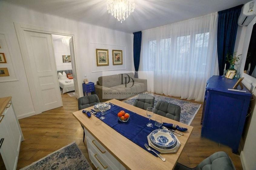 Apartament cu 3 camere semidecomandat, mobilat în Central
