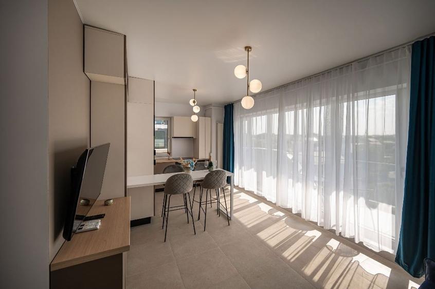 Apartament cu 2 camere semidecomandat, mobilat în Nord