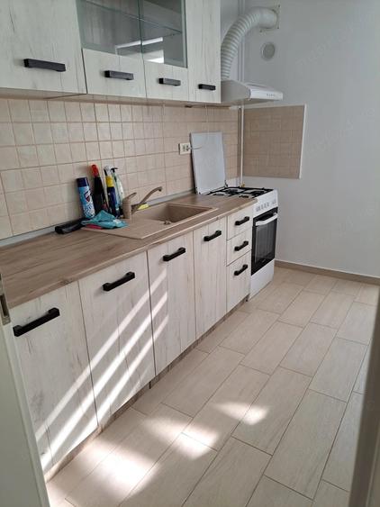 Apartament cu 2 camere decomandat în Tractorul