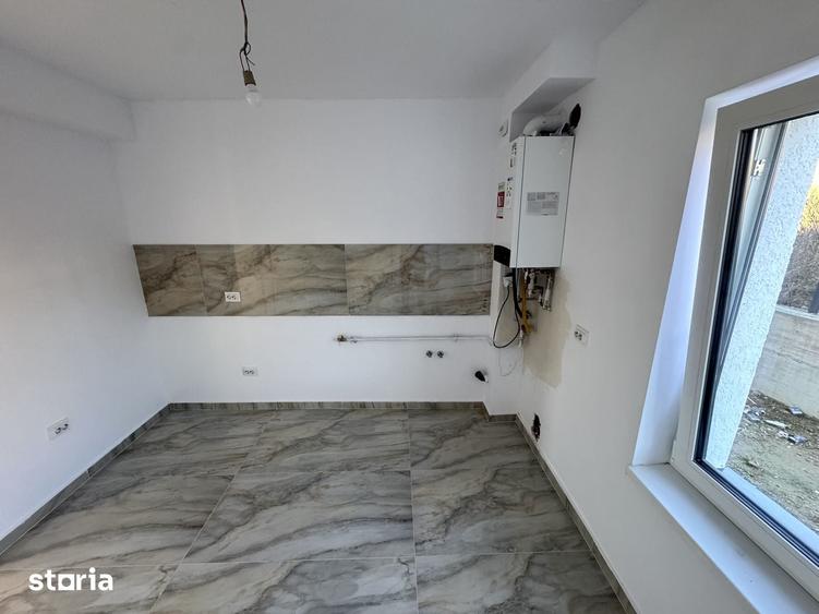 Casă cu 4 camere cu Teren 300 Mp în Bucium