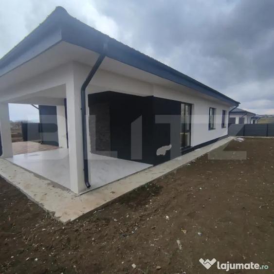 Casă cu 4 camere cu Teren 400 Mp în Central