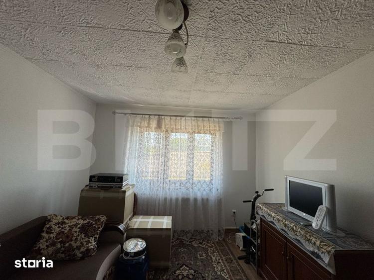 Casă cu 6 camere cu Teren 1000 Mp în Sântuhalm