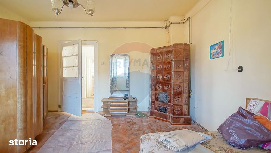 Casă cu 2 camere cu Teren 230 Mp în Schei