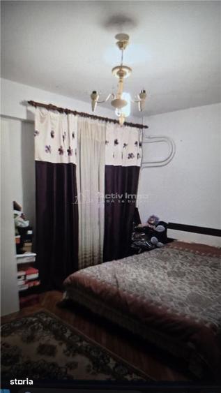 Apartament cu 4 camere decomandat în Bordei