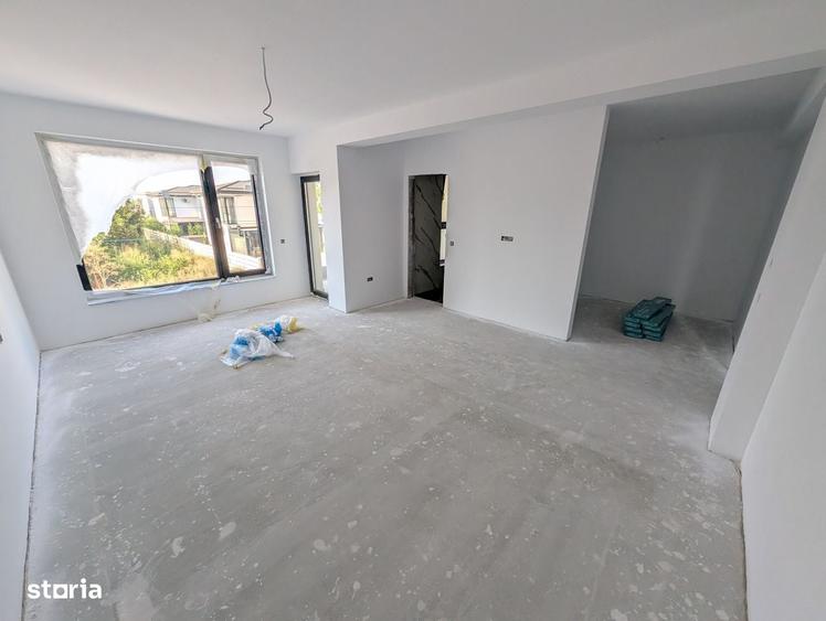 Casă cu 4 camere în Tunari