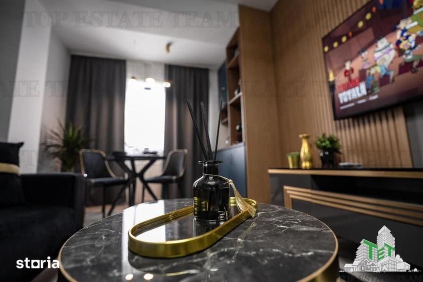 Apartament cu 2 camere complet mobilat si utilat de vanzare in zona d - 4