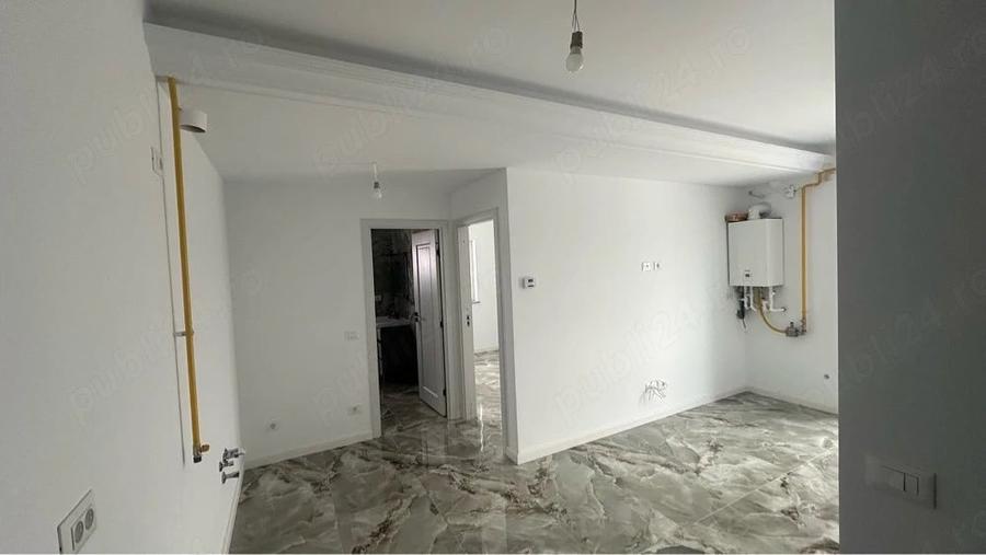 Apartament cu 2 camere semidecomandat în Tișăuți