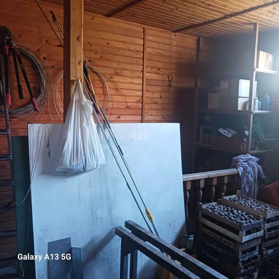 Casa de lemn + teren 2950 m2, sub 5km de centrul Tg.Mures