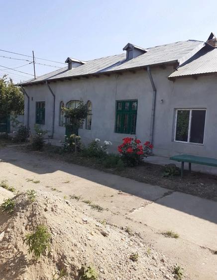 Casă cu Teren 950 Mp în Calomfirești