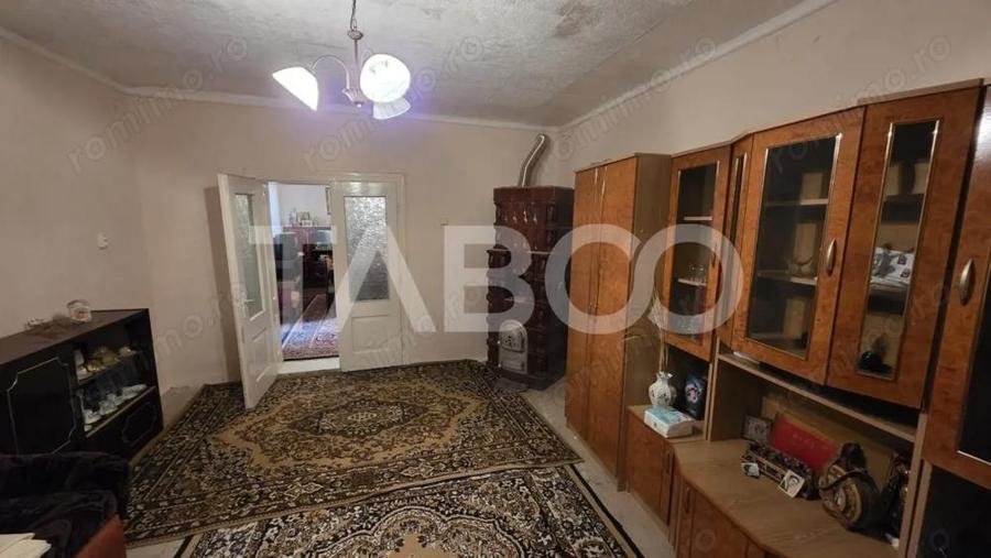 Casă cu 3 camere cu Teren 5859 Mp în Deal