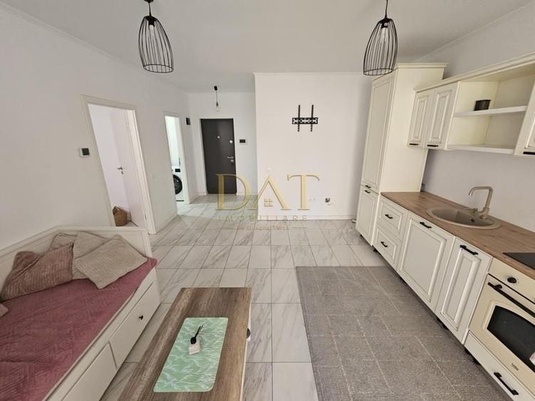 Apartament cu 2 camere semidecomandat în Chinteni