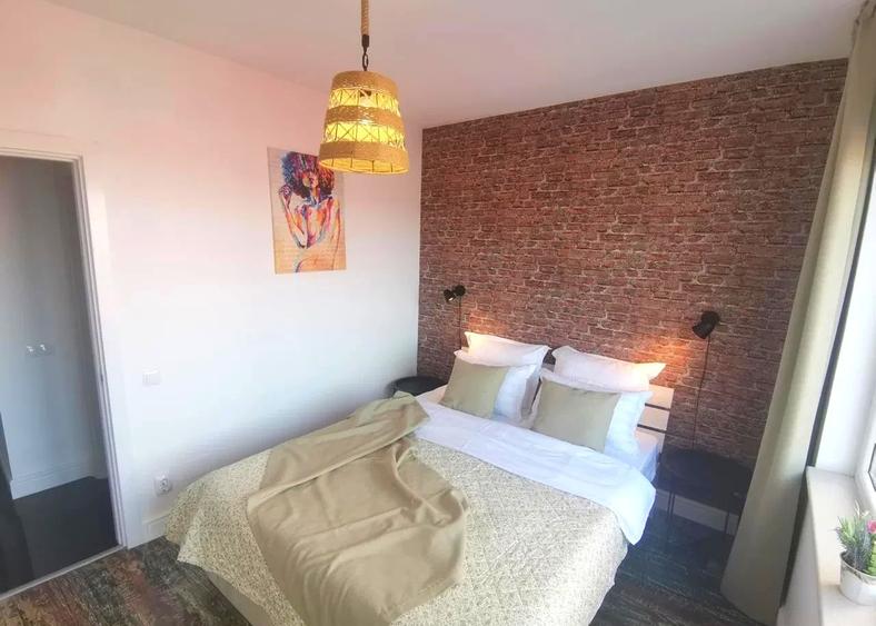 Apartament cu 2 camere semidecomandat, mobilat în Baciu