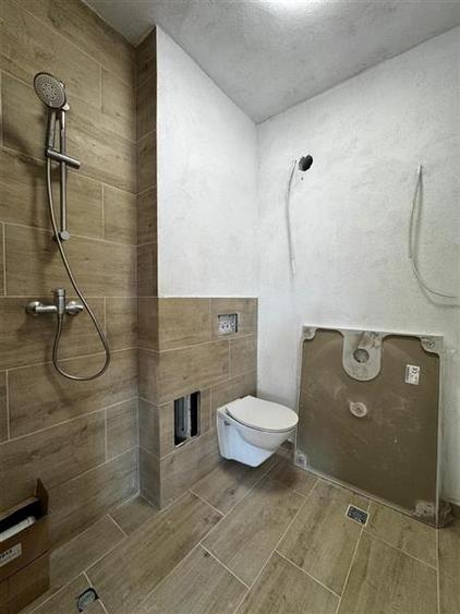 Apartament cu 3 camere semidecomandat, mobilat în Borhanci