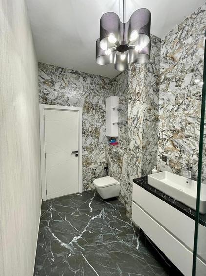 Apartament cu 2 camere semidecomandat, mobilat în Florești