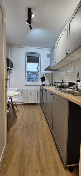 Apartament cu 2 camere semidecomandat în Olteniței
