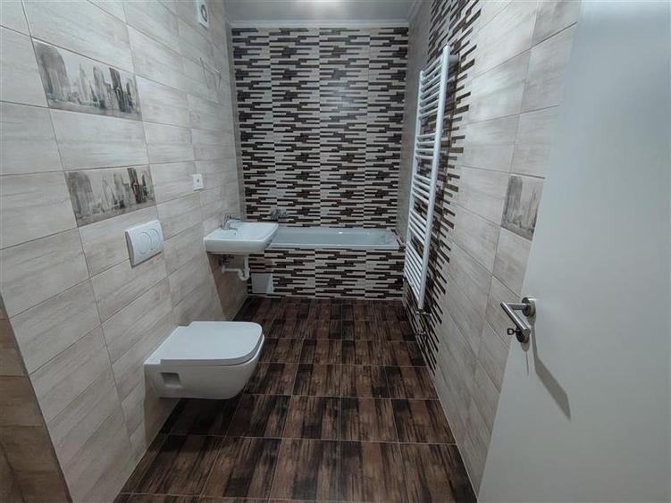 Apartament cu 2 camere decomandat în Tractorul