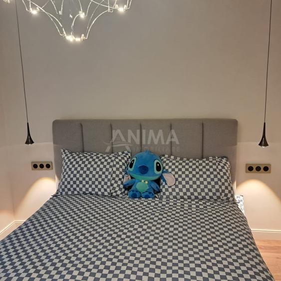 Apartament cu 2 camere semidecomandat, mobilat în Central