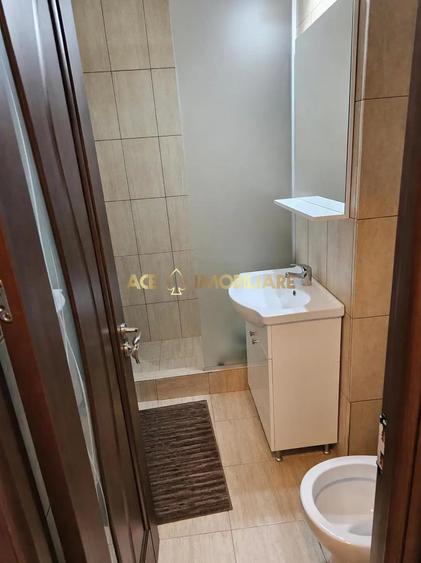 Apartament cu 2 camere semidecomandat, mobilat în Costin Georgian