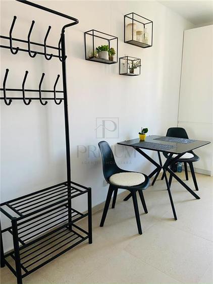 Apartament cu 2 camere semidecomandat, mobilat în Torontalului