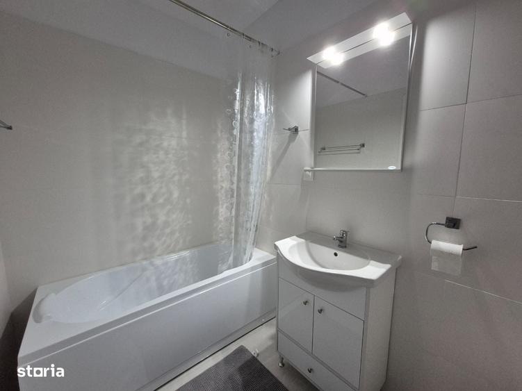 Bdul Bucuresti, nou, ap 2 camere cu centrala si AC, 450 euro, et 4/9 - 1