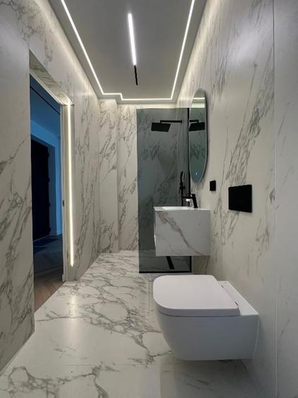 Casă individuală cu 5 camere cu Teren 500 Mp în Central