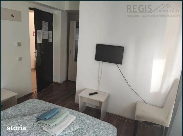 Casă cu 9 camere cu Teren 500 Mp în Central