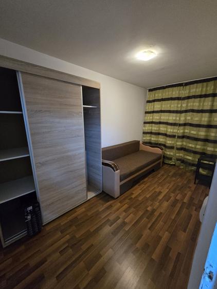 Apartament cu 2 camere decomandat în Tractorul