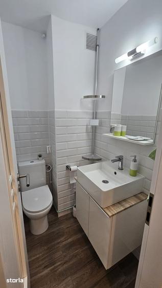 Apartament cu 3 camere semidecomandat, mobilat în Girocului