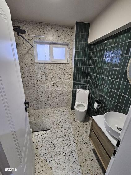Apartament cu 3 camere decomandat în Sud