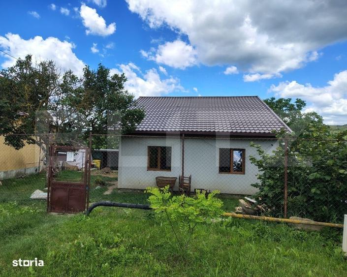 Casă cu 4 camere în Comșești