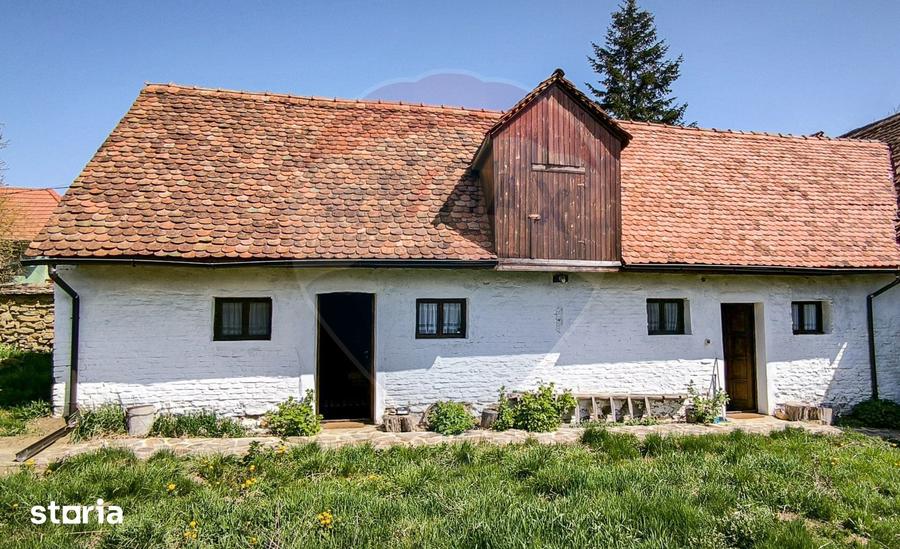 Casă cu 4 camere cu Teren 1631 Mp în Bruiu