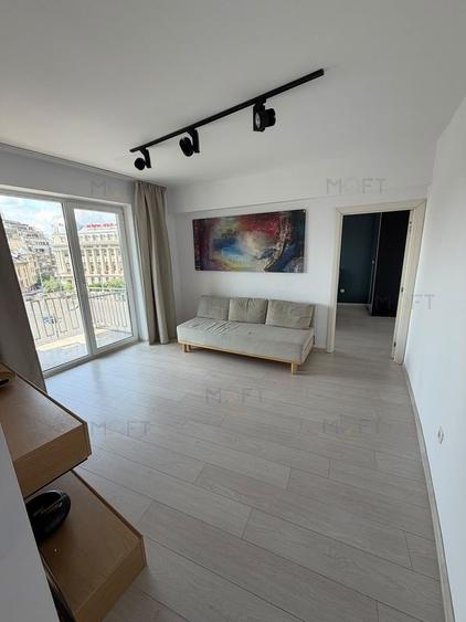 Apartament cu 3 camere semidecomandat în P-ța Romană