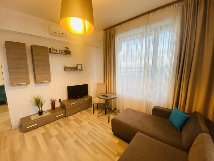 Apartament cu 2 camere semidecomandat, mobilat în Central