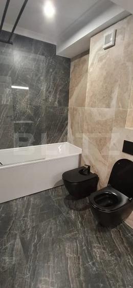 Apartament cu 4 camere decomandat în Filiași