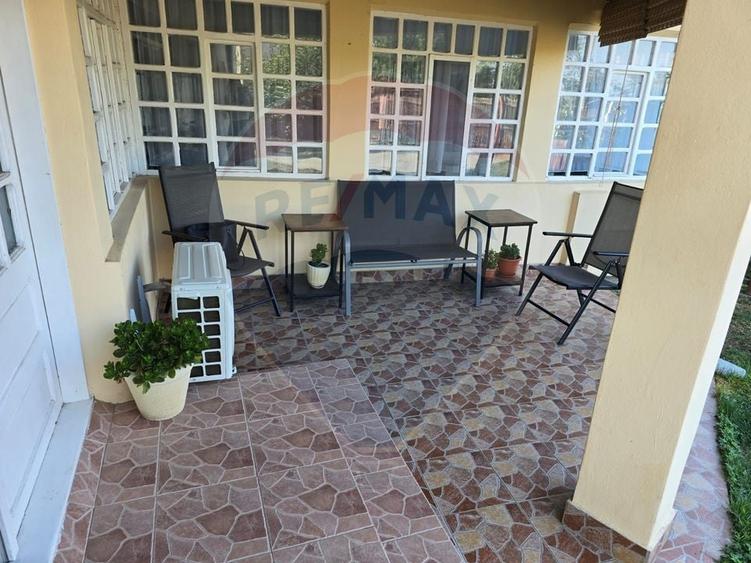 Casă cu 4 camere cu Teren 1000 Mp în Central