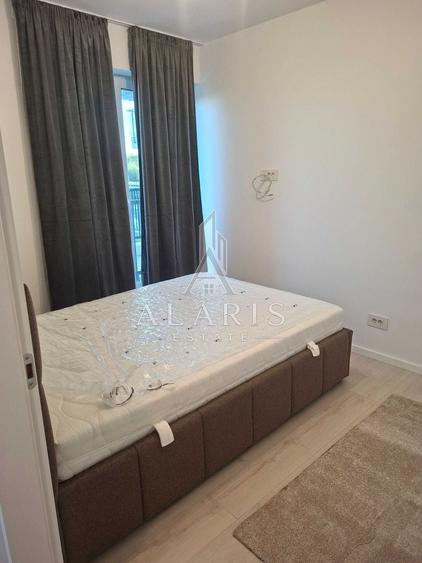 Apartament cu 3 camere semidecomandat, mobilat în Nord