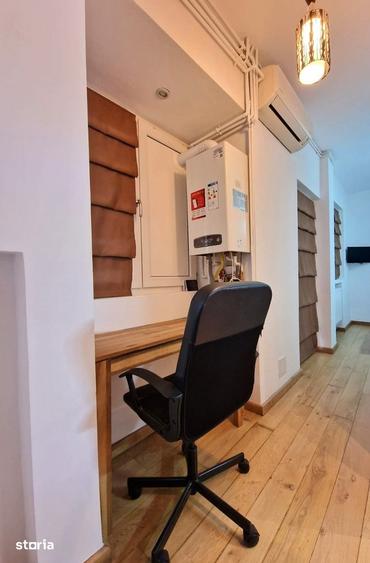 Apartament cu 3 camere în Romană