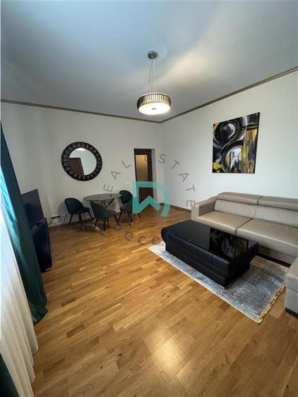 Apartament cu 2 camere semidecomandat, mobilat în Central