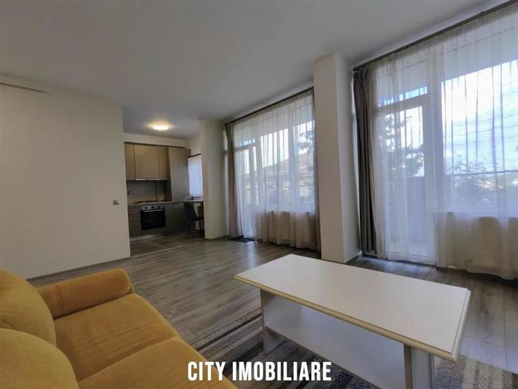 Apartament cu 2 camere semidecomandat, mobilat în Borhanci
