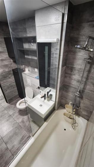 Apartament cu 2 camere decomandat, mobilat în Podul de Fier