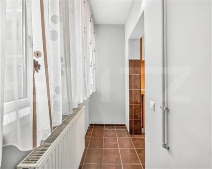 Apartament cu 2 camere semidecomandat, mobilat în Tractorul