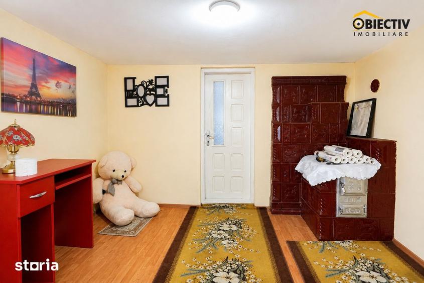 Casă cu 2 camere cu Teren 3477 Mp în Costișa