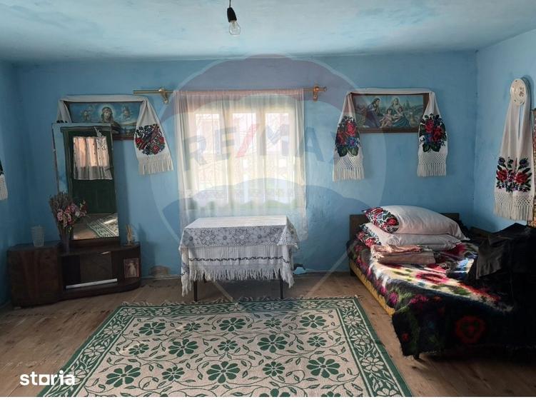 Casă cu 2 camere cu Teren 1304 Mp în Rozavlea