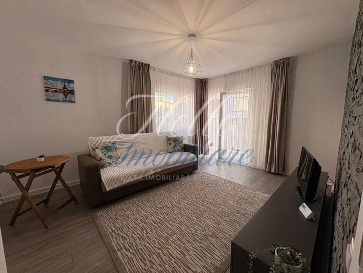 Apartament cu 2 camere semidecomandat, mobilat în Florești